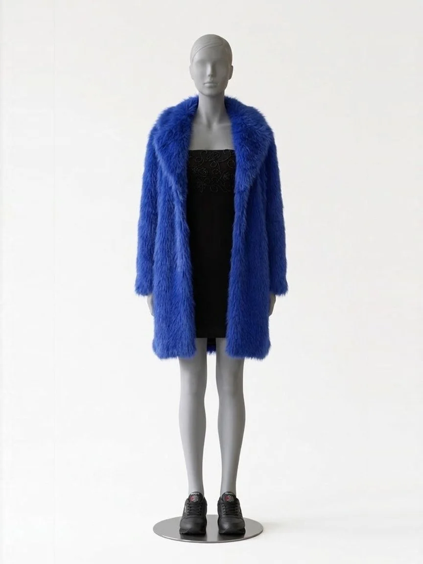 AI try-on render of the Zapaka royal blue faux fur coat over a black bodycon mini dress, with black Reebok Classic Leather sneakers, on our size 8 mannequin